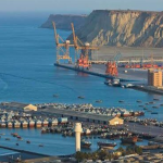 Gwadar Port’s state-of-the-art terminals and expansive coastline, highlighting its role as Pakistan’s biggest seaport.
